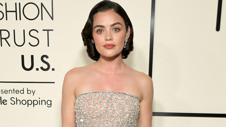 Actress Lucy Hale in a silver strapless dress at a Fashion Trust U.S. event.