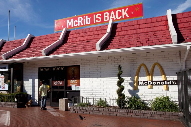 The outside of McDonald's with a McRib is back sign
