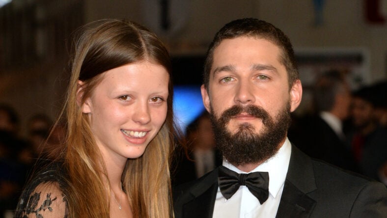 Mia Goth and Shia LeBeouf attend the closing night European Premiere gala red carpet arrivals for "Fury" during the 58th BFI London Film Festival at Odeon Leicester Square on October 19, 2014 in London, England
