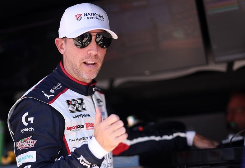 Denny Hamlin, driver of the #11 National Debt Relief Toyota, looks on during practice for the NASCAR Cup Series South Point 400 at Las Vegas Motor Speedway on October 03