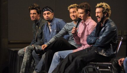 Members ofthe band NSYNC speak during the press conference for performers in the Super Bowl halftime show at the Tampa Convention Center in Tampa, Florida