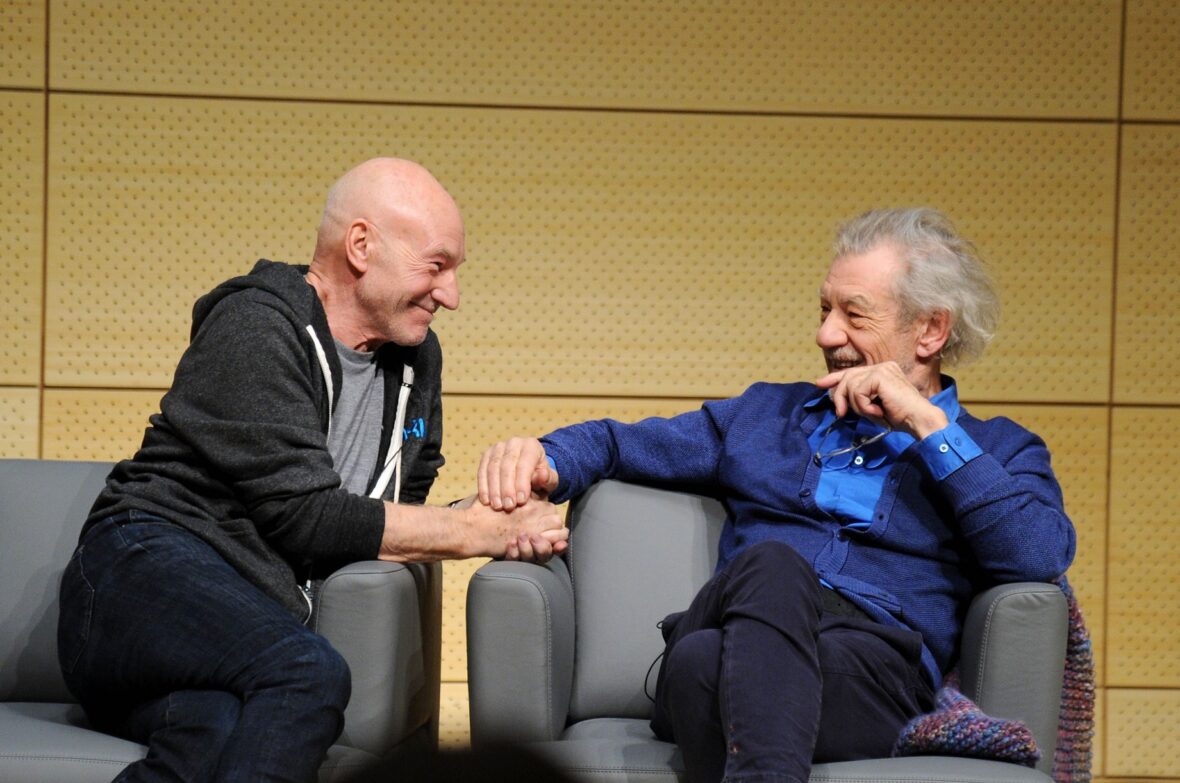 Patrick Stewart and Ian McKellen posing together for a photo.