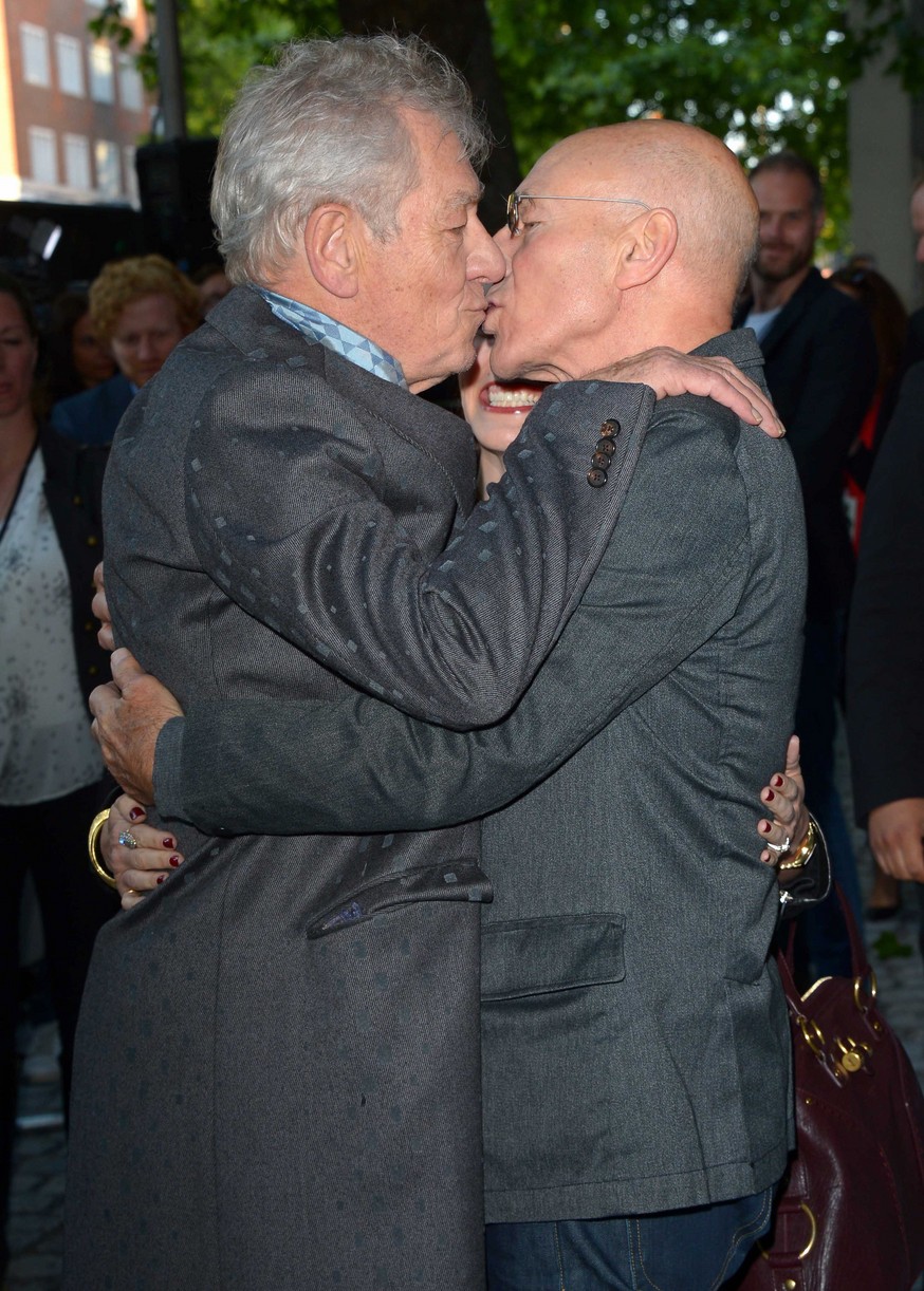 Patrick Stewart and Ian McKellen posing together for a photo.
