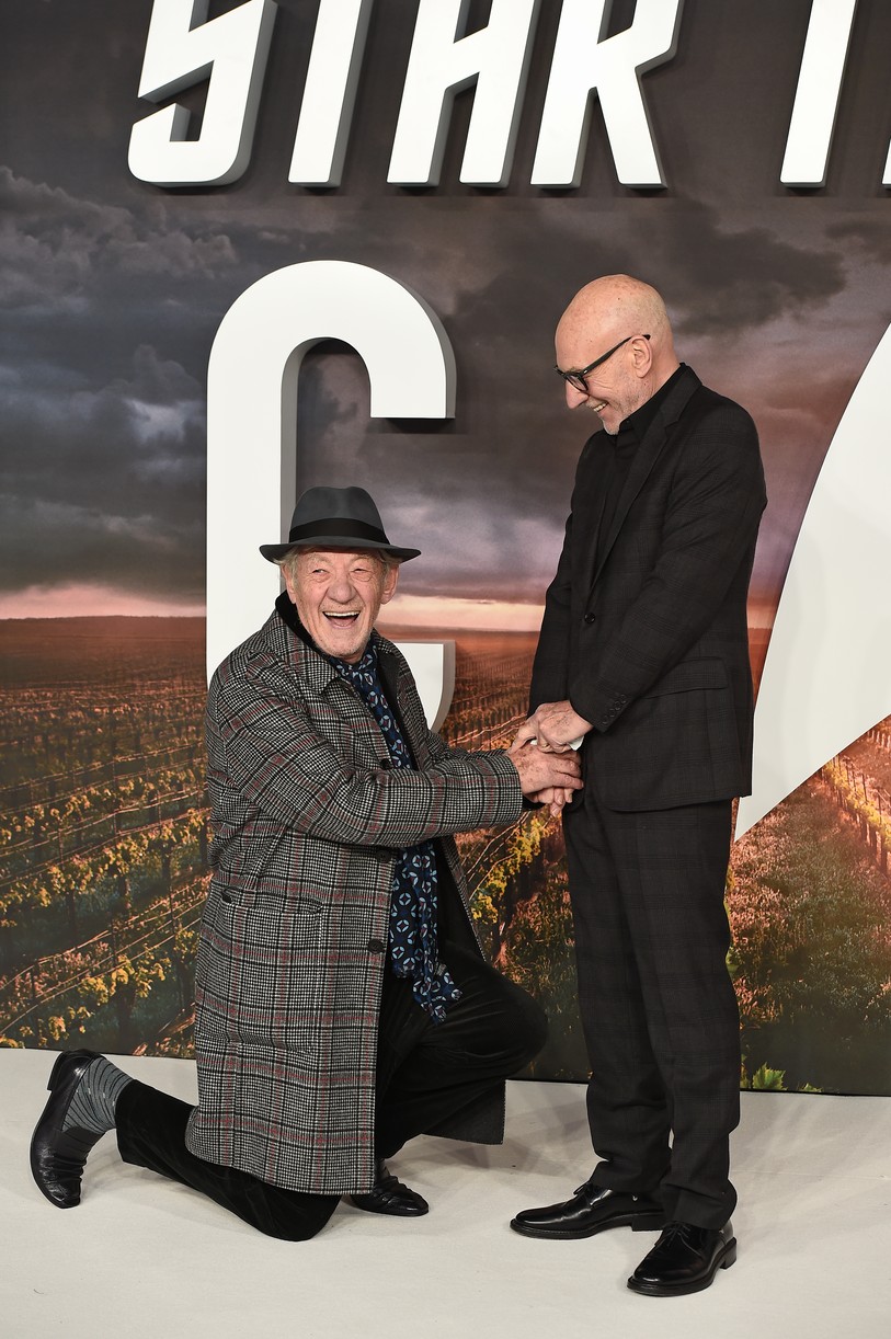Patrick Stewart and Ian McKellen posing together for a photo.