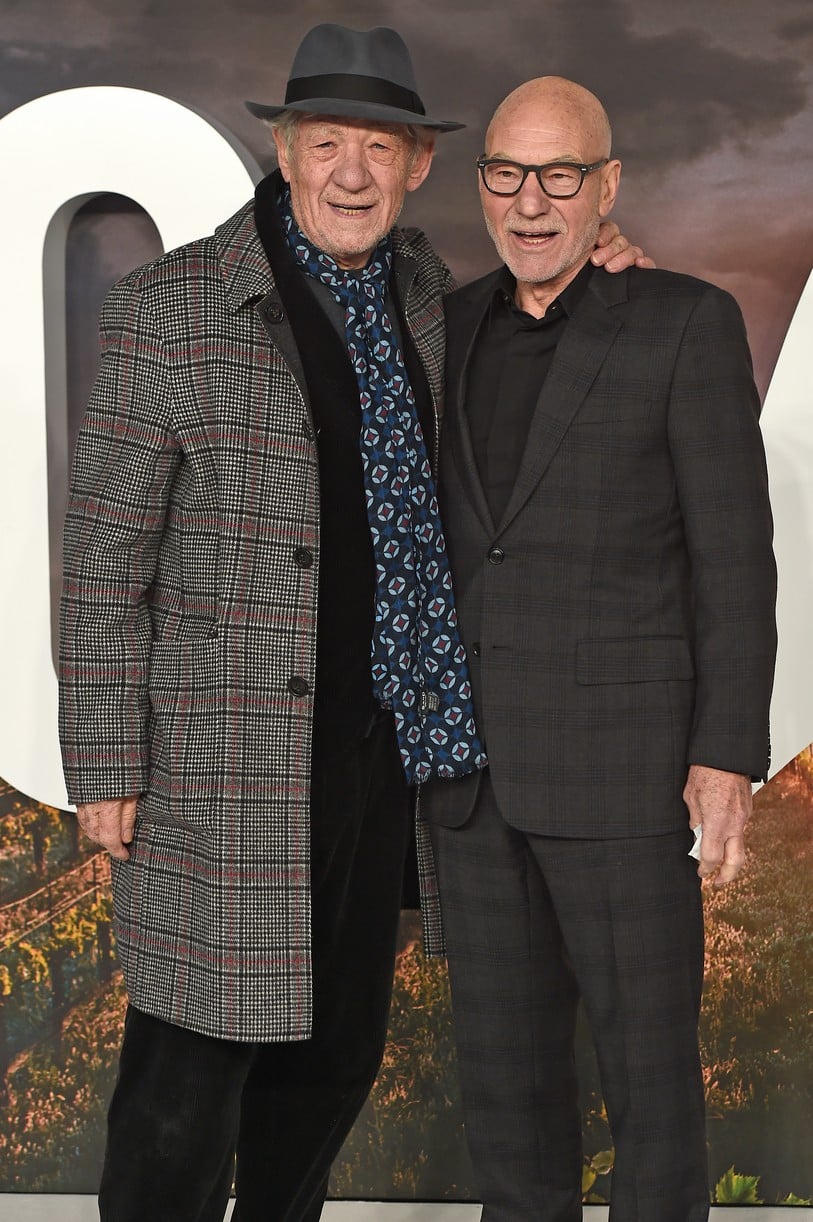 Patrick Stewart and Ian McKellen posing together for a photo.