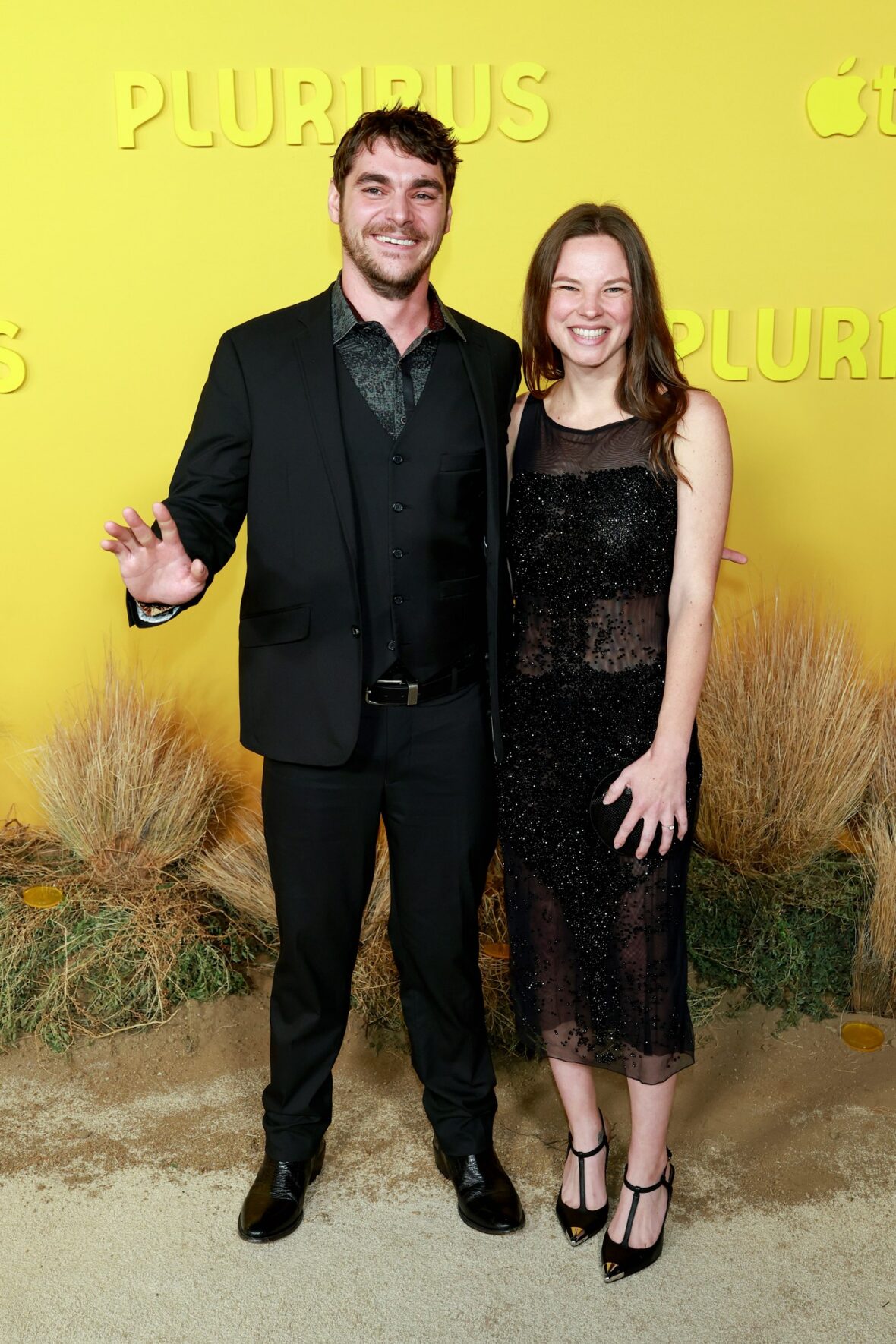 RJ Mitte and Kennedy Suarez attend the world premiere of Apple TV+'s "Pluribus" at DGA Theater Complex on November 04, 2025 in Los Angeles, California.
