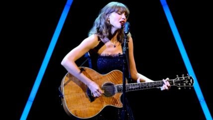 Taylor Swift performing at Academy Gala
