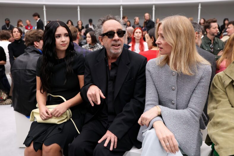 Tim Burton and daughter Nell in all black at the Loewe show with Delphine Arnault.