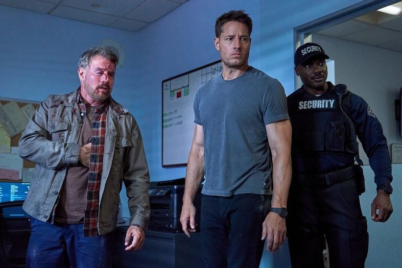 Tracker Season 4 still Derek Phillips as Sean Wooledge, Justin Hartley as Colter Shaw, Hiram Murray as Security Guard