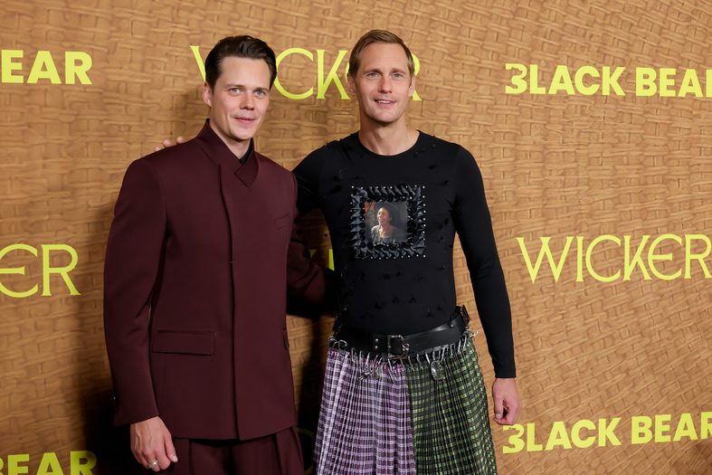 Bill Skarsgard and Alexander Skarsgard pose on the carpet at the Los Angeles premiere of his new movie Wicker